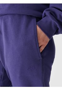 4f - 4F Spodnie dresowe joggery uniseks - granatowe XL. Kolor: niebieski. Materiał: dresówka. Wzór: gładki, ze splotem