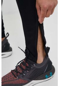 Adidas - adidas spodnie dresowe kolor czarny z nadrukiem. Kolor: czarny. Materiał: dresówka. Wzór: nadruk #5