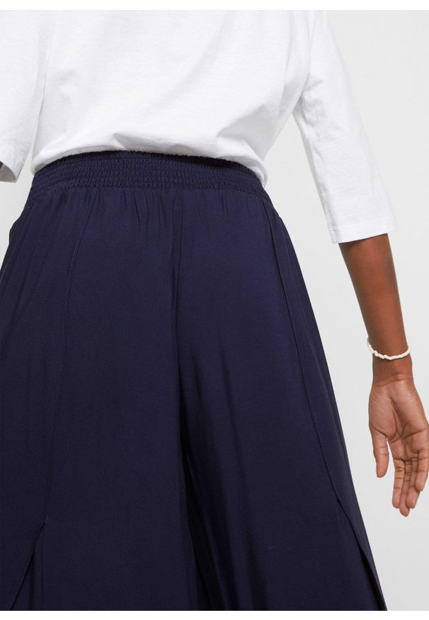 bonprix - Spodnie culotte w długości do łydki, z miękkiej wiskozy. Kolor: niebieski. Materiał: wiskoza. Styl: elegancki