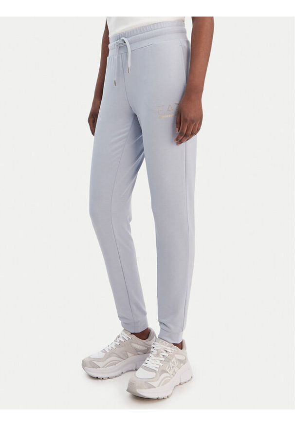 EA7 Emporio Armani Spodnie dresowe 8NTP66 TJ9RZ U9309 Błękitny Regular Fit. Kolor: niebieski. Materiał: syntetyk