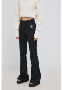 adidas Performance spodnie x Karlie Kloss damskie kolor czarny dzwony high waist. Stan: podwyższony. Kolor: czarny. Materiał: dzianina, bawełna