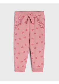 Sinsay - Bawełniane spodnie jogger - różowy. Kolor: różowy. Materiał: bawełna