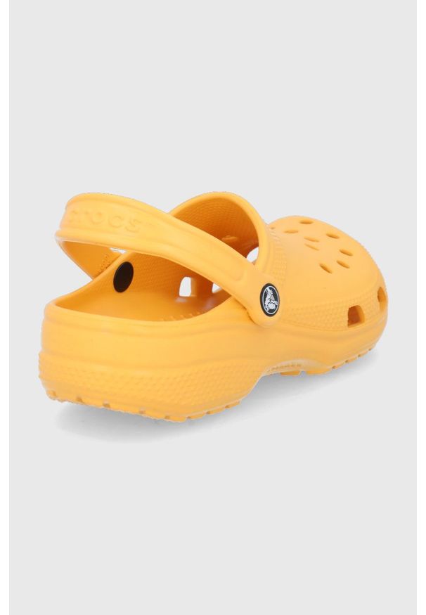 Crocs - Klapki. Kolor: pomarańczowy. Materiał: materiał. Wzór: gładki