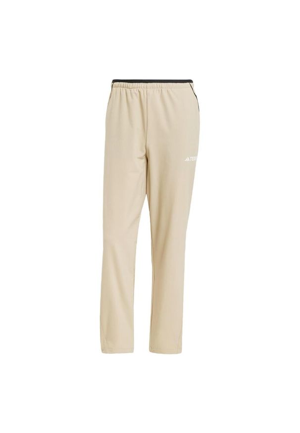 Adidas - Spodnie Terrex Multi Liteflex. Kolor: beżowy. Materiał: materiał. Sport: turystyka piesza