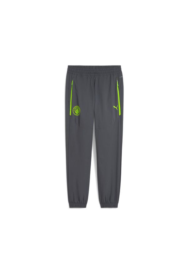 Puma - Spodnie dresowe Manchester City Woven 2025/26. Kolor: szary. Materiał: dresówka. Sport: piłka nożna