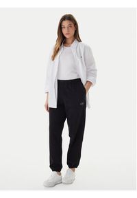 Calvin Klein Jeans Spodnie dresowe Foil Monologo LV047E826G Czarny Regular Fit. Kolor: czarny. Materiał: bawełna #3