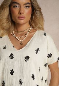 Renee - Beżowa Bluzka z Wiskozą z Krótkim Rękawem Typu Nietoperz w Kwiatowy Print Lannelle. Okazja: na co dzień. Typ kołnierza: dekolt w serek. Kolor: beżowy. Materiał: wiskoza. Długość rękawa: krótki rękaw. Długość: krótkie. Wzór: kwiaty, nadruk. Styl: elegancki, casual #5