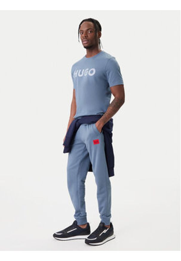 Hugo - HUGO Spodnie dresowe Doak212 50447963 Granatowy Regular Fit. Kolor: niebieski. Materiał: bawełna