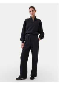 GAP - Gap Spodnie dresowe 523579-01 Czarny Regular Fit. Kolor: czarny. Materiał: bawełna #5