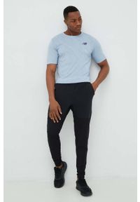 New Balance spodnie treningowe Q Speed męskie kolor czarny. Kolor: czarny. Materiał: materiał #3