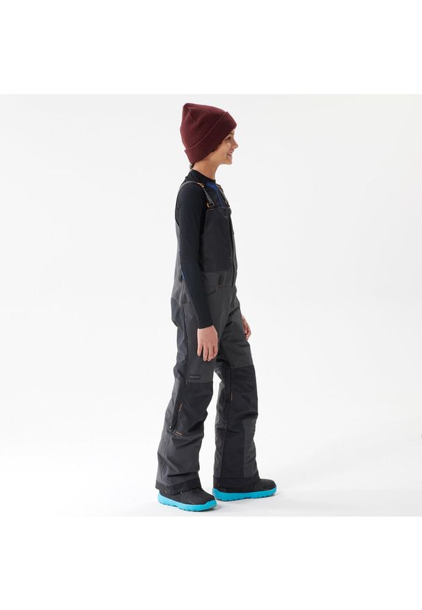 DREAMSCAPE - Spodnie snowboardowe ogrodniczki dla dzieci Dremscape BIB 500. Kolor: czarny, szary, wielokolorowy. Materiał: polar, materiał. Sezon: zima. Sport: snowboard