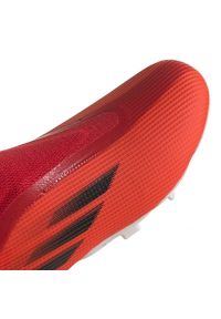 Adidas - Buty piłkarskie adidas X Speedflow.3 Fg Ll Jr FY3257 wielokolorowe pomarańcze i czerwienie. Kolor: wielokolorowy. Materiał: dzianina, syntetyk. Szerokość cholewki: normalna. Sport: piłka nożna #4