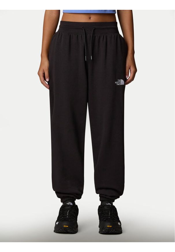The North Face Spodnie dresowe Essential NF0A8C1G Czarny Relaxed Fit. Kolor: czarny. Materiał: syntetyk