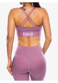 SUPER.NATURAL - Stanik sportowy Super.natural Super Top. Kolor: różowy. Sport: fitness