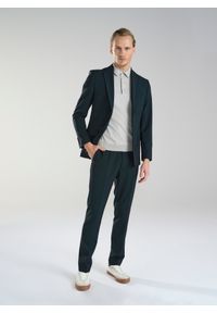 Pako Lorente - PAKO LORENTE – Wełniane zielone spodnie garniturowe. Kolor: zielony. Materiał: wełna. Styl: elegancki