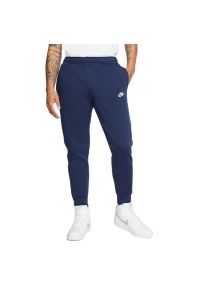 Spodnie Nike Sportswear Club Fleece BV2671-410 - granatowe. Kolor: niebieski. Materiał: poliester, bawełna, dresówka. Wzór: aplikacja #1