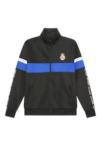Dres piłkarski dziecięcy Real Madrid 24/25. Kolor: czarny. Materiał: dresówka. Styl: młodzieżowy, sportowy