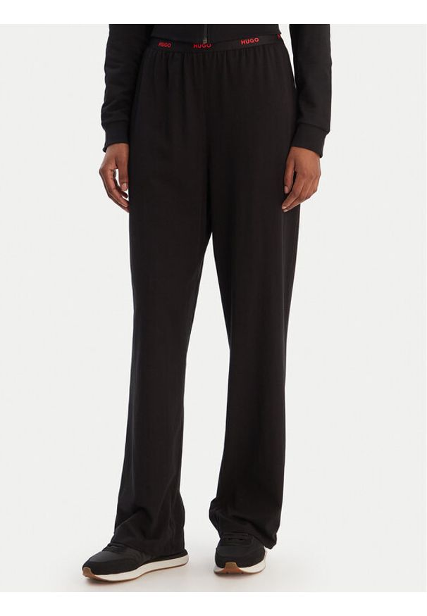Hugo - HUGO Spodnie piżamowe 50555624 Czarny Regular Fit. Kolor: czarny. Materiał: bawełna