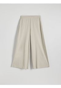 Reserved - Szerokie spodnie - jasnozielony. Kolor: zielony. Materiał: dzianina #1