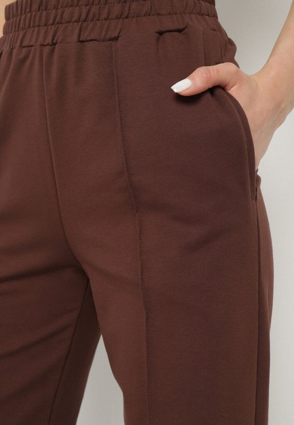 Born2be - Brązowe Spodnie Szerokie Geniriel. Stan: podwyższony. Kolor: brązowy. Materiał: dzianina