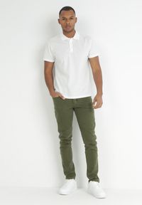 Born2be - Ciemnozielone Spodnie Slim Ridhi. Kolor: zielony. Długość: długie. Wzór: jednolity #4