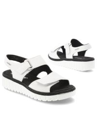 Sandały damskie Rieker, cholewka ze skóry naturalnej z materiałowym wnętrzem zapinane na rzep, białe, V1382-80. Okazja: na co dzień, na spacer. Zapięcie: rzepy. Kolor: biały. Materiał: materiał, skóra. Wzór: paski. Sezon: lato. Styl: klasyczny, casual #6