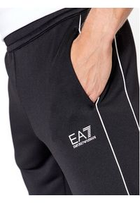 EA7 Emporio Armani Spodnie dresowe 6RPP53 PJ16Z 1200 Czarny Regular Fit. Kolor: czarny. Materiał: dresówka, syntetyk #7