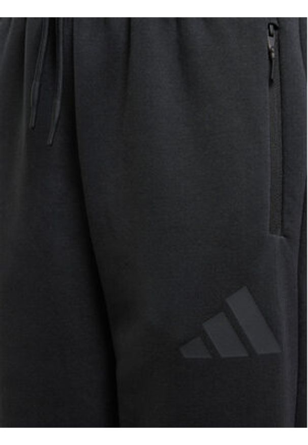 Adidas - adidas Spodnie dresowe Z.N.E. JF2491 Czarny Tapered Leg. Kolor: czarny. Materiał: syntetyk