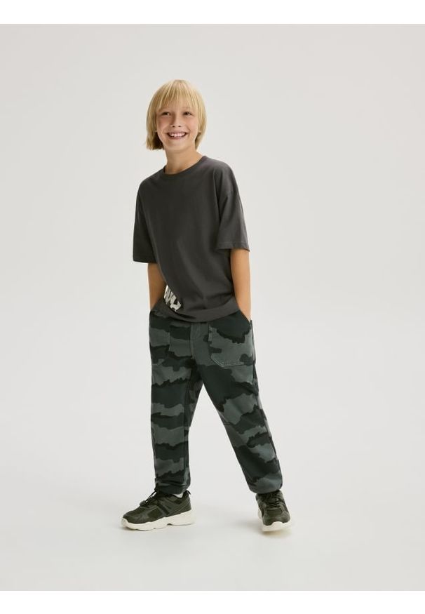 Reserved - Bawełniane spodnie jogger - czarny. Kolor: czarny. Materiał: bawełna