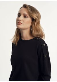 Ochnik - Sweter z wiązaniem na plecach damski. Kolor: czarny. Materiał: wiskoza. Długość: długie. Wzór: aplikacja #1