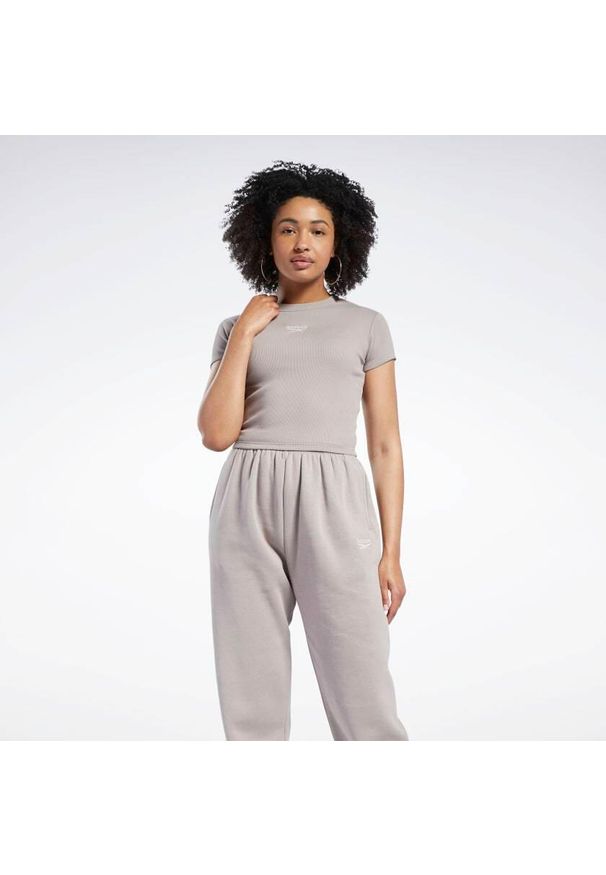 Koszulka sportowa damska Reebok Ribbed. Kolor: brązowy, beżowy. Materiał: elastan, bawełna