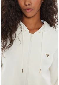 Guess - GUESS Damska bluza w kolorze ecru Olympe. Kolor: beżowy