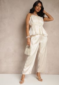 Renee - Jasnobeżowe Eleganckie Spodnie o Szerokim Kroju z Satynowym Połyskiem Lionea. Okazja: na spotkanie biznesowe, na co dzień. Kolor: beżowy. Materiał: satyna. Styl: elegancki