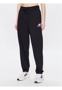New Balance Spodnie dresowe WP31530 Czarny Relaxed Fit. Kolor: czarny. Materiał: syntetyk, dresówka, bawełna