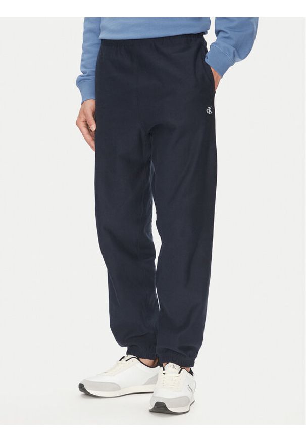 Calvin Klein Jeans Spodnie dresowe Premium LV04RC279G Granatowy Regular Fit. Kolor: niebieski. Materiał: bawełna