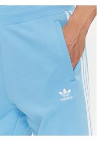Adidas - adidas Spodnie dresowe adicolor 3-Stripes IM9451 Niebieski Slim Fit. Kolor: niebieski. Materiał: bawełna #3
