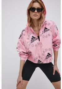 Adidas - adidas kurtka damska kolor różowy przejściowa oversize. Kolor: różowy. Materiał: materiał, skóra