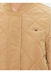 TOMMY HILFIGER - Tommy Hilfiger Kurtka przejściowa WW0WW42376 Beżowy Regular Fit. Kolor: beżowy. Materiał: syntetyk
