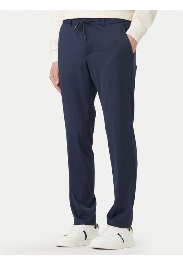Guess Chinosy M5BB75 WHHO2 Granatowy Slim Fit. Kolor: niebieski. Materiał: syntetyk