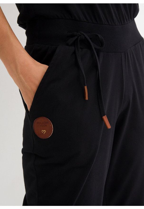 bonprix - Kombinezon z dżerseju, z mieszanki bawełny. Kolor: czarny. Materiał: jersey, bawełna