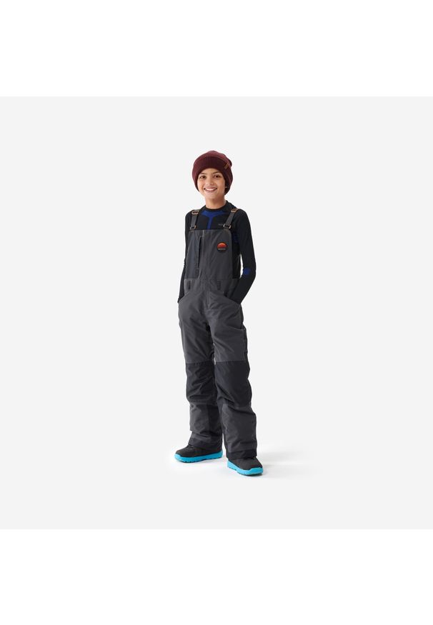 DREAMSCAPE - Spodnie snowboardowe ogrodniczki dla dzieci Dremscape BIB 500. Kolor: czarny, szary, wielokolorowy. Materiał: polar, materiał. Sezon: zima. Sport: snowboard