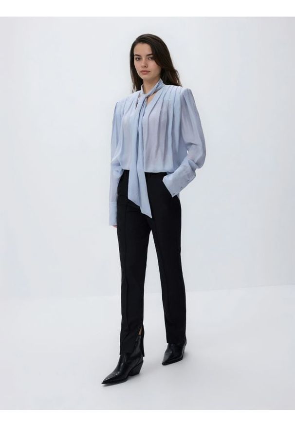 Reserved - Spodnie z suwakami - czarny. Kolor: czarny. Materiał: wiskoza, dzianina