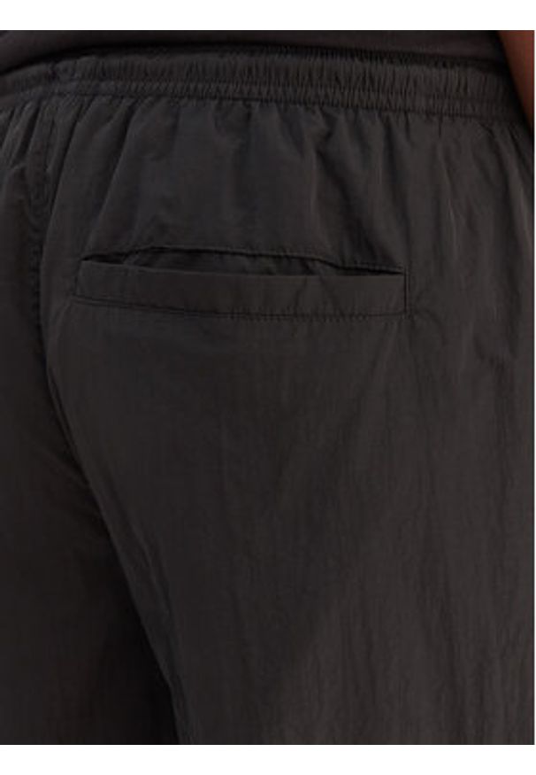 Tommy Jeans Spodnie materiałowe DW0DW22289 Czarny Regular Fit. Kolor: czarny. Materiał: syntetyk