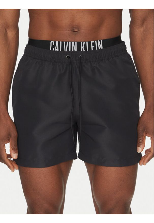 Calvin Klein Swimwear Szorty kąpielowe KM0KM01093 Czarny Regular Fit. Kolor: czarny. Materiał: syntetyk