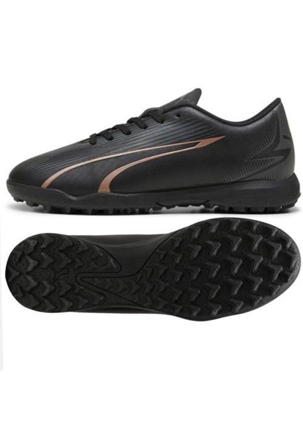 Buty piłkarskie dla dzieci Puma Ultra Play Tt Jr. Zapięcie: sznurówki. Kolor: brązowy, czarny, wielokolorowy. Materiał: guma, syntetyk, tkanina, materiał. Szerokość cholewki: normalna. Sport: piłka nożna