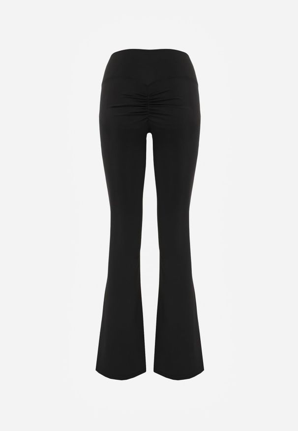 Renee - Czarne Legginsy Flare High Waist Ozdobione z Tyłu Modelującym Marszczeniem Deinoreia. Okazja: na co dzień. Stan: podwyższony. Kolor: czarny. Wzór: aplikacja. Styl: elegancki, casual