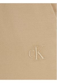 Calvin Klein Jeans Chinosy J30J317669 Beżowy Slim Fit. Kolor: beżowy. Materiał: bawełna