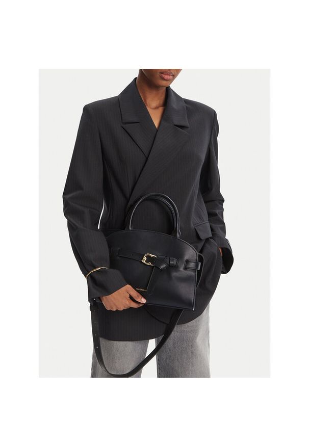 Torebka Coccinelle. Kolor: czarny