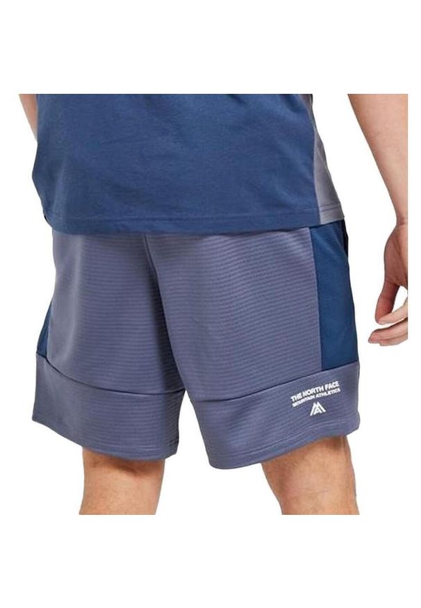 Szorty The North Face Face Mountain Athletics Fleece Short, Mężczyźni. Kolor: niebieski. Materiał: poliester, materiał. Długość: krótkie. Sezon: lato