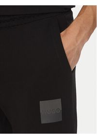 Hugo - HUGO Spodnie dresowe Dusplitan 50542866 Czarny Relaxed Fit. Kolor: czarny. Materiał: bawełna #4